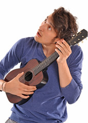 Obraz premium Afinando mi guitarra.