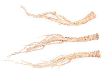 Dried ginseng on white background.