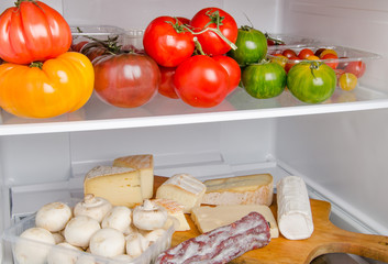 Different food products inside a refrigerator