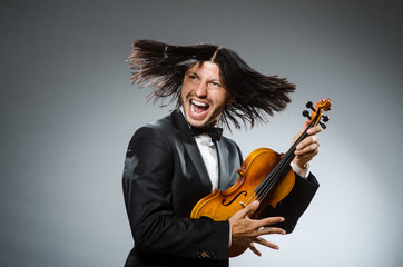 Man violin player in musican concept © Elnur