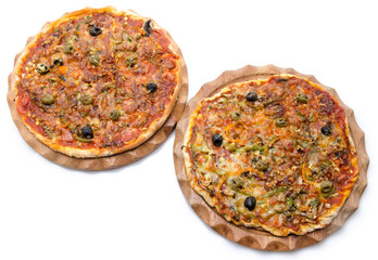 Two pizzas on a wooden board