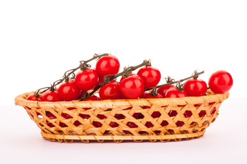 cherry tomatoes isolated in a basket