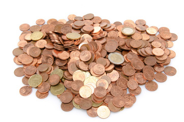 Growth concept with a green small plant planted in coins