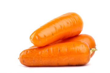 Fresh carrots on a white background