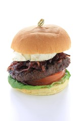 gourmet beefburger with goats cheese isolated