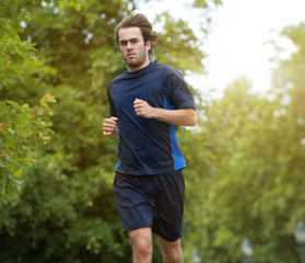 Man jogging outdoors in the forest