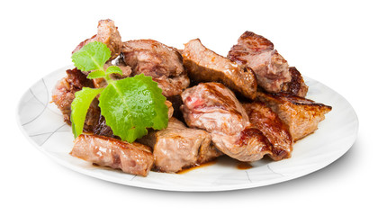 Grilled Meat On A White Plate Served With Mint Leaf