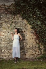 Fototapeta na wymiar Girl in white dress