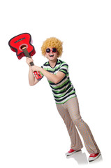 Man with afro wig with guitar on white