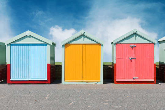 Colourful beach huts in Brighton on the beach