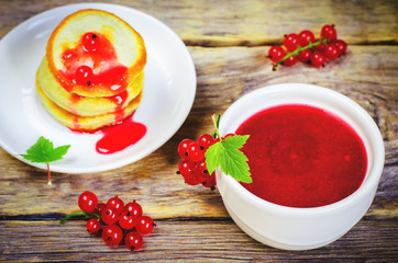 red currants jam in the white bowl