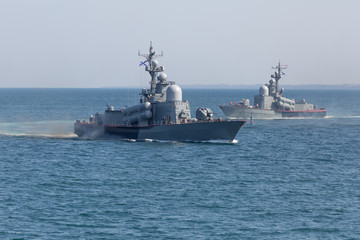 Two naval ships in the sea