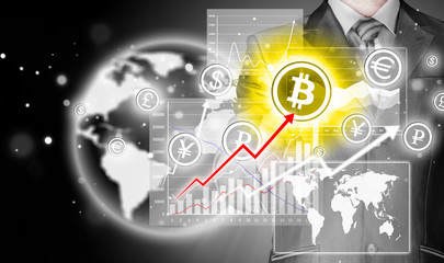Obraz premium Choosing bitcoins, businessman pressing touch screen button.