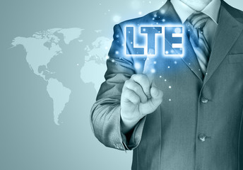 businessman is pushing his finger on lte button