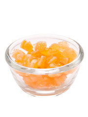 close up of a bowl of candied orange citrus peel isolated