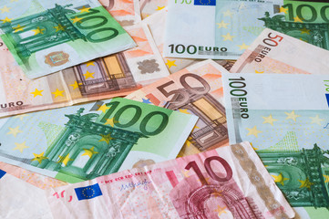 A pile of different Euro banknotes for business and finance