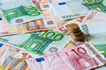 Pile of Euros and coins for business and finance