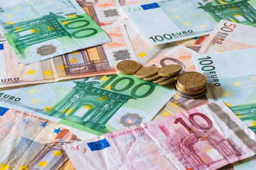 Pile of Euros and coins for business and finance
