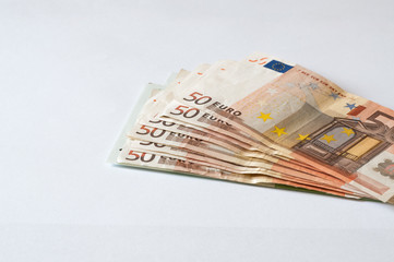 Pile of money Euros isolated on white for business and finance