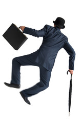 businessman jumping and kicking his heels isolated on white