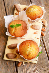 Tasty cupcakes on table close-up