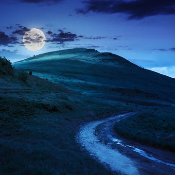 mountain path uphill to the sky at night