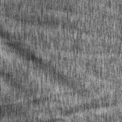 Grey fabric texture with a delicate striped pattern.