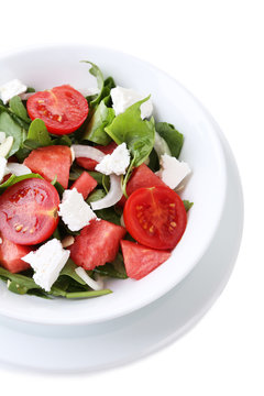 Salad with watermelon, feta, arugula and spinach leaves