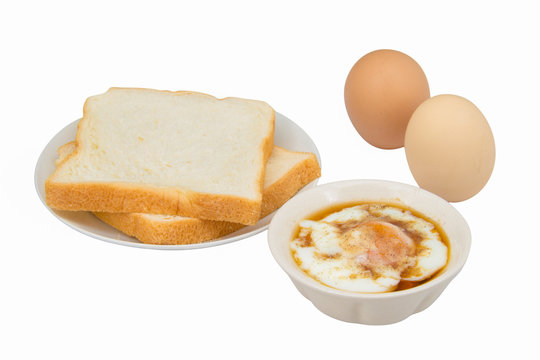 bread and soft boiled egg isolated
