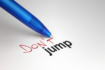 Obraz premium Don't jump. Written on white paper