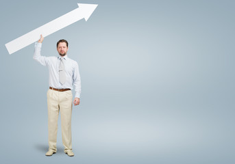 Fototapeta premium Businessman with arrow