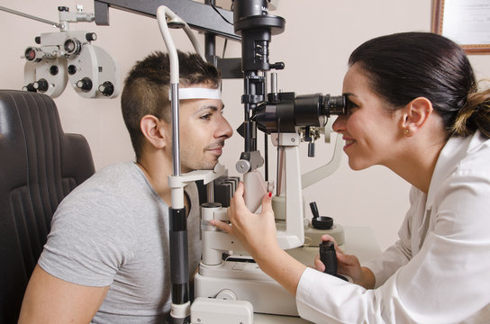 Optical Exam To Young Man, Professional Woman