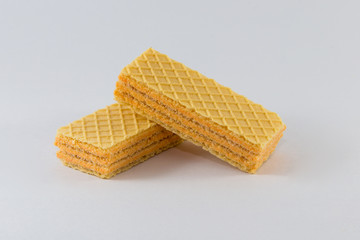 Two waffles on a white background