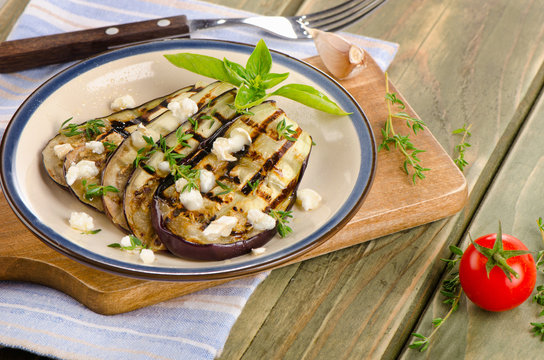 Grilled eggplant slices on a plate