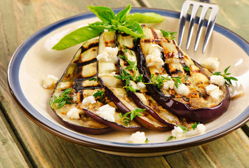 Grilled eggplant slices on a plate