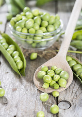 Fresh Peas on a cooking spoon