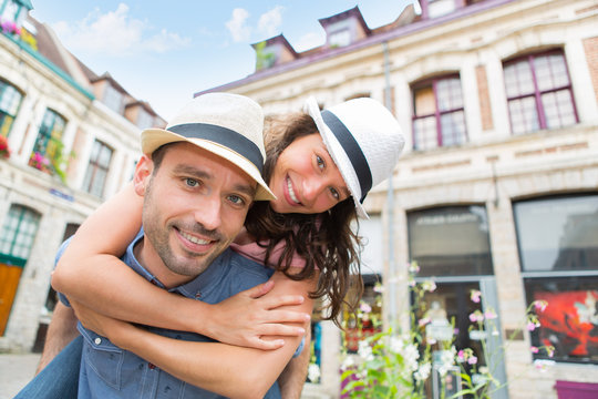 Young happy couple having fun on holidays