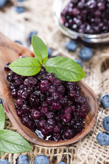 Wooden Spoon with canned Blueberries