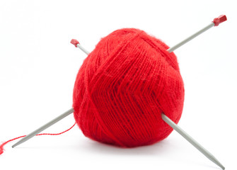The Skein of Wool with Knitting Needles