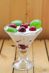 Dessert fruit cherries wooden background