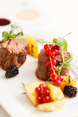 steak with fresh berries