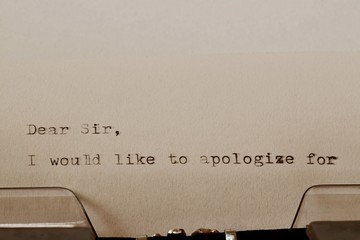 Text Dear Sir typed on old typewriter