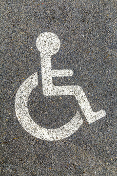 Disabled parking permit sign on the street