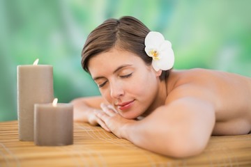 Obraz na płótnie Canvas Beautiful young woman on massage tabl