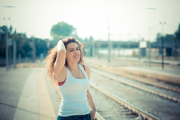 Fototapeta premium young beautiful long curly hair hipster woman
