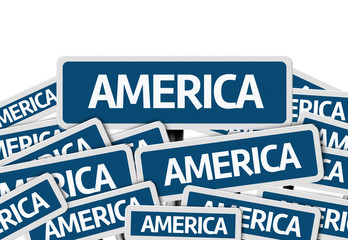 America written on multiple blue road sign