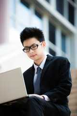 young businessman working outside