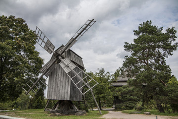 Fototapeta na wymiar Wooden windmill