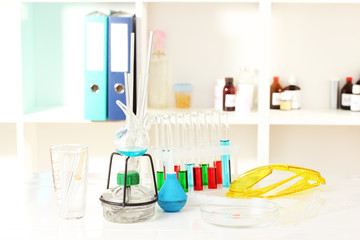 Different laboratory glassware with color liquid