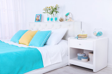 Comfortable soft bed in room